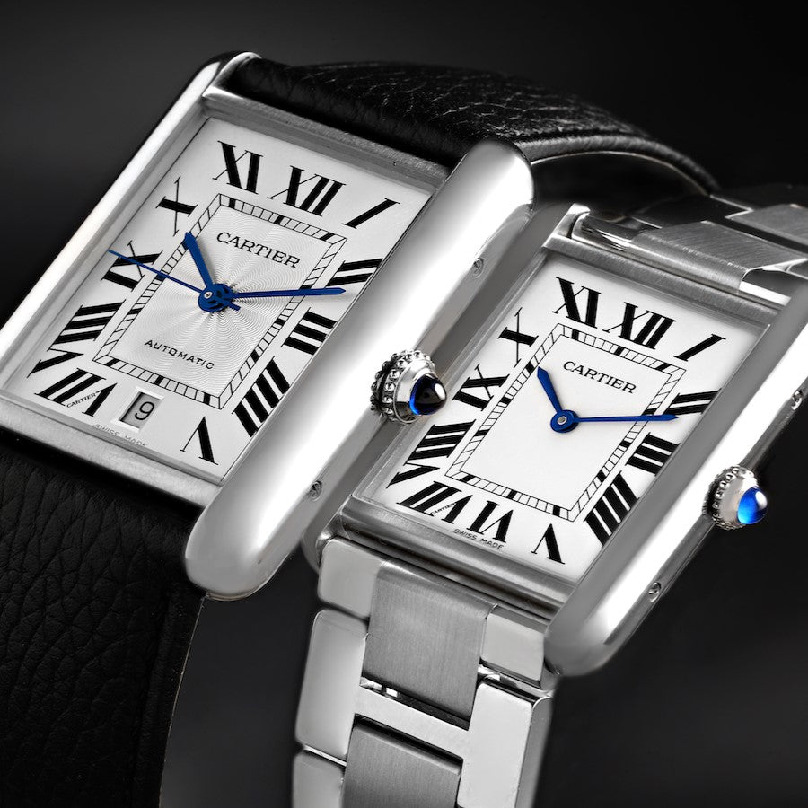 Cartier Tank watches with leather strap and steel bracelet side by side